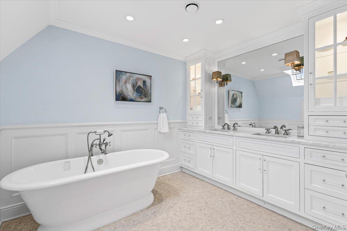 2 Cowles Avenue Rye, NY 10580 - Photo 29 of 35 a bathroom with a bathtub and a sink