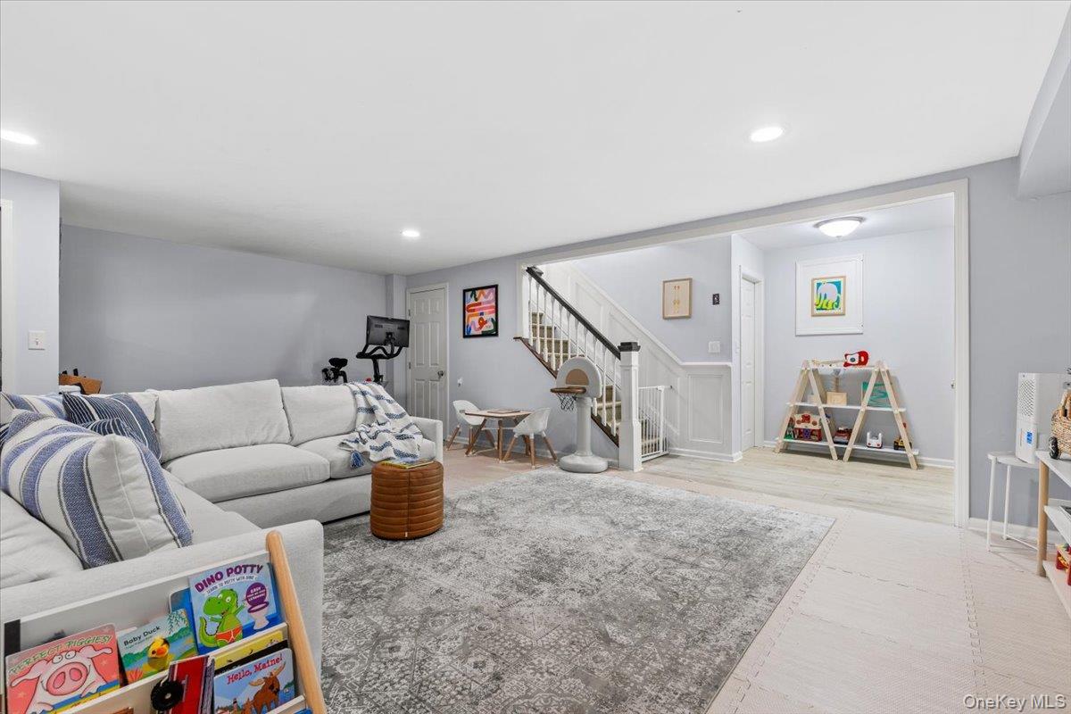 2 Cowles Avenue Rye, NY 10580 - Photo 31 of 35 a living room with furniture and a wooden floor