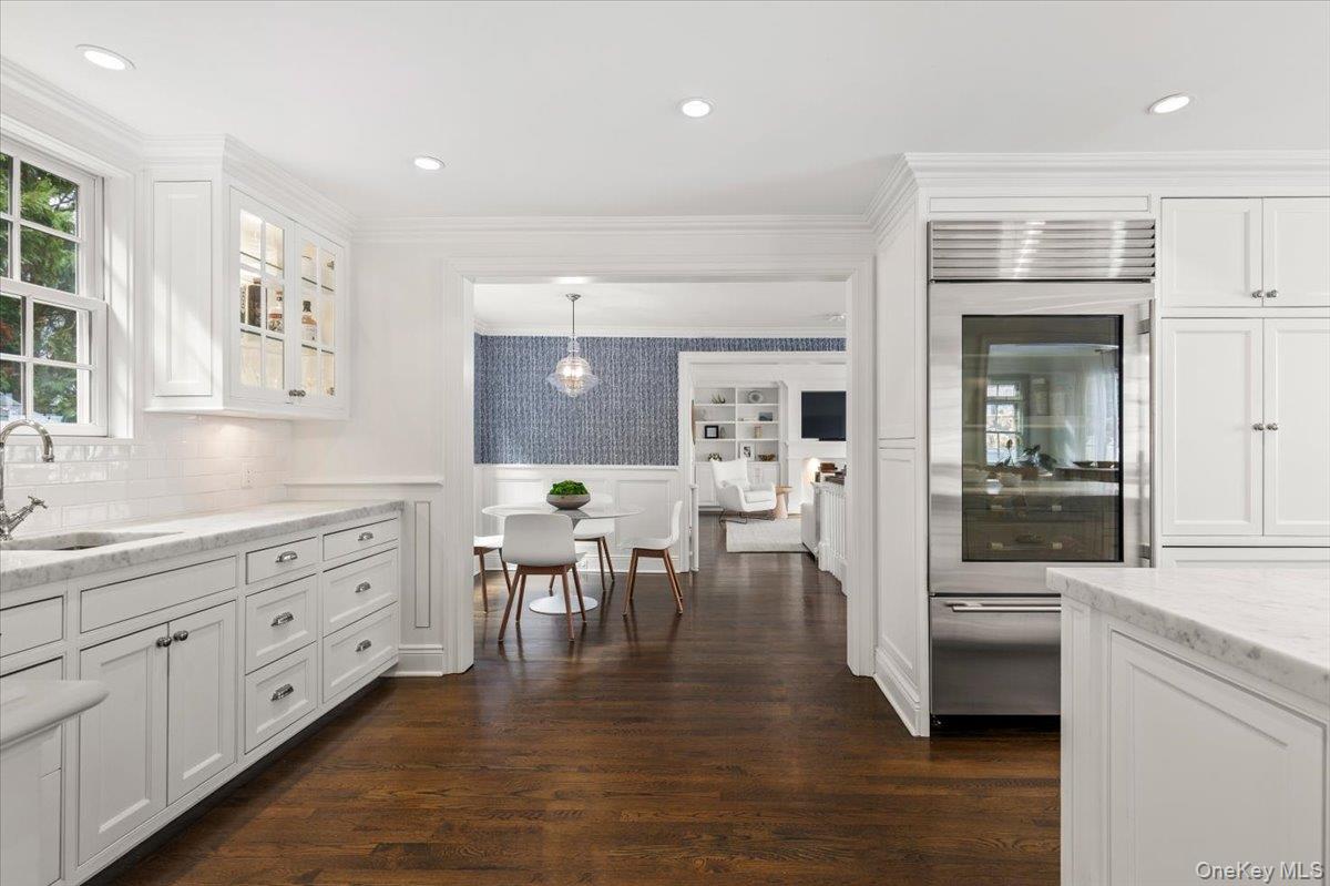 2 Cowles Avenue Rye, NY 10580 - Photo 9 of 35 a kitchen with white cabinets and counter space