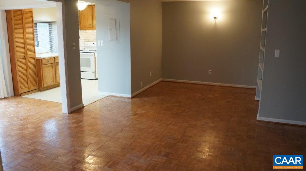 46 Spring Court, Unit 46 Charlottesville, VA 22901 - Photo 7 of 27 a view of an empty room with a window
