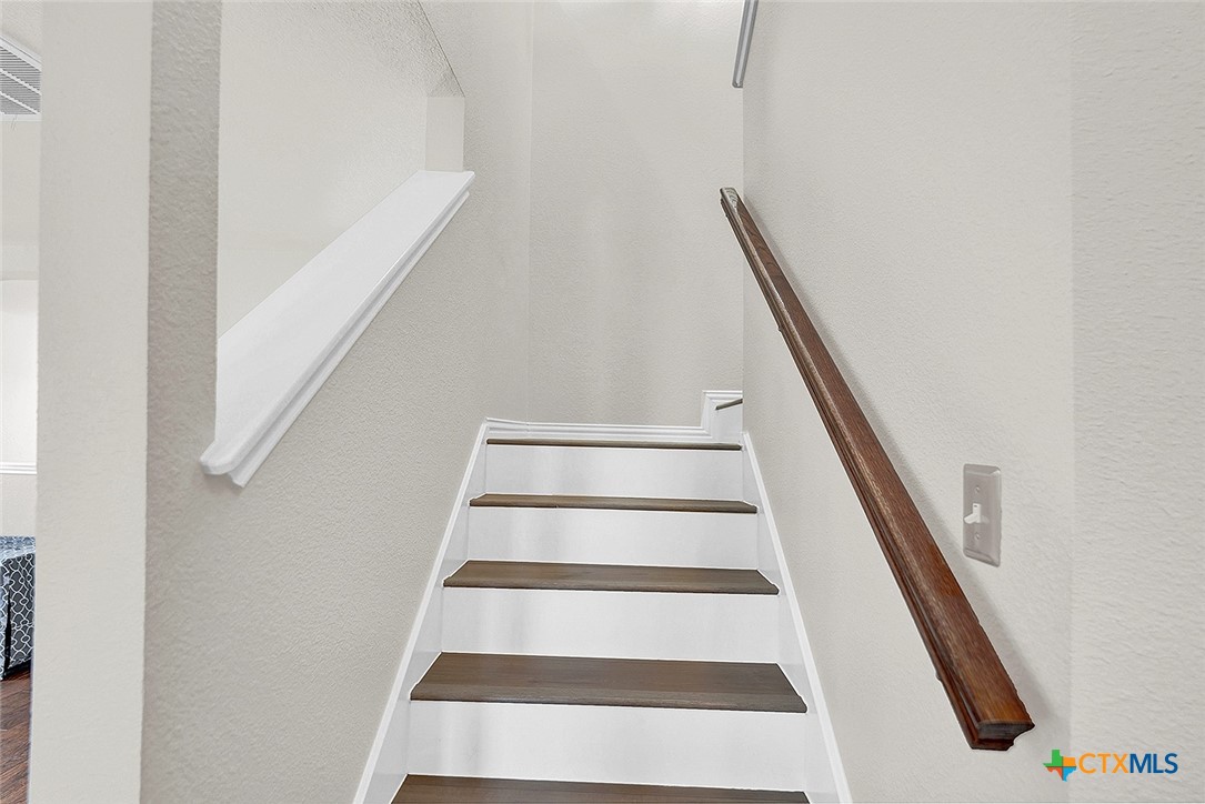 113 Endeavour Kyle, TX 78640 - Photo 16 of 38 a view of staircase with white walls and windows