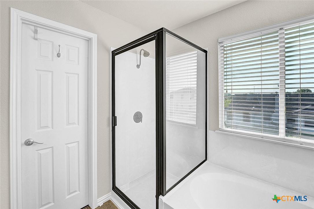 113 Endeavour Kyle, TX 78640 - Photo 21 of 38 a view of a bathroom with a window