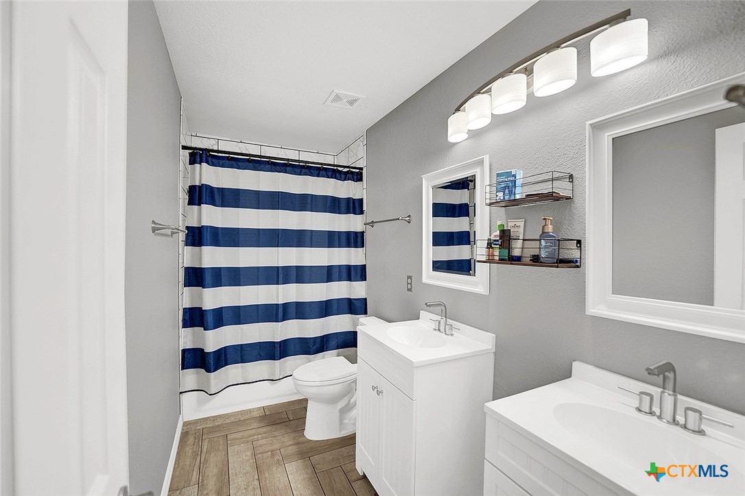 113 Endeavour Kyle, TX 78640 - Photo 27 of 38 a bathroom with a sink toilet and shower