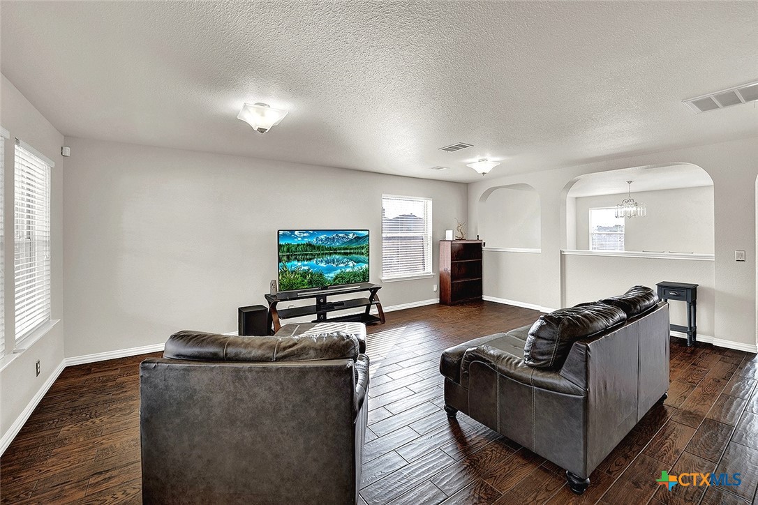 113 Endeavour Kyle, TX 78640 - Photo 6 of 38 a living room with furniture and a flat screen tv