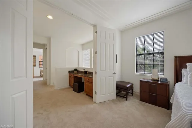 a view of a livingroom with furniture and windows