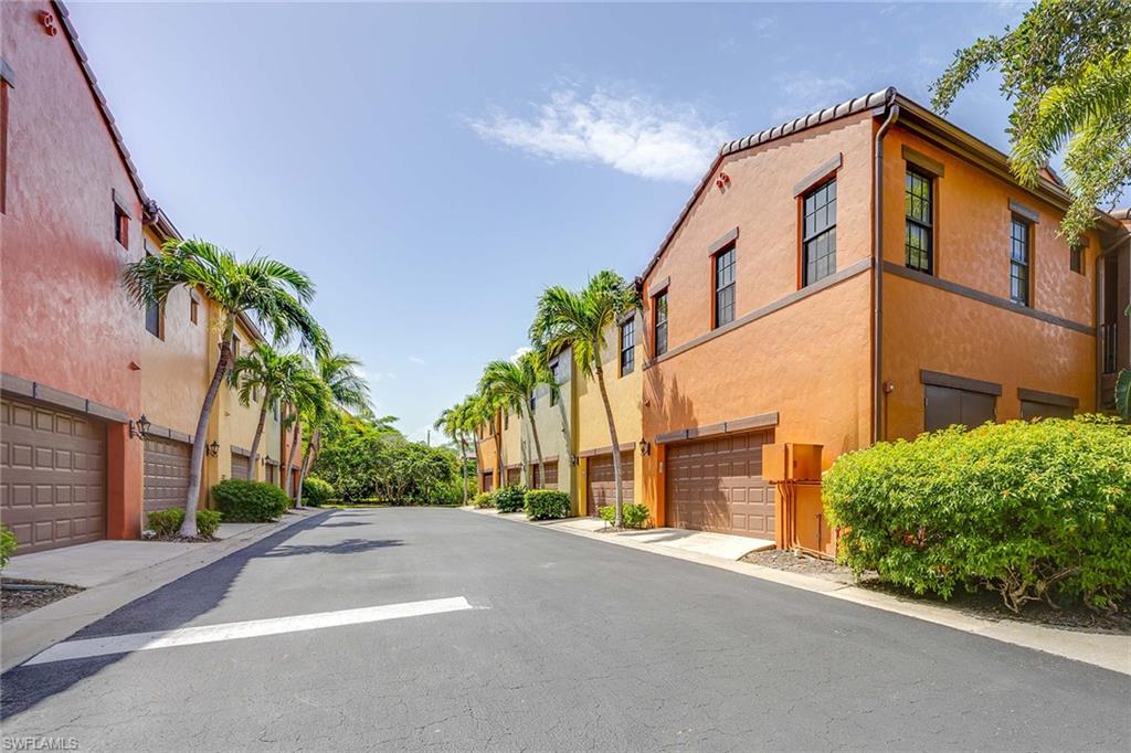9134 Chula Vista Street, Unit 125 Naples, FL 34113 - Photo 23 of 44 a view of a house with a street