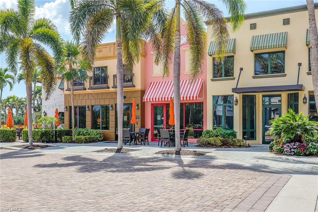9134 Chula Vista Street, Unit 125 Naples, FL 34113 - Photo 40 of 44 front view of a building