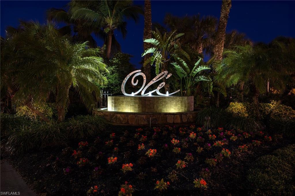 9134 Chula Vista Street, Unit 125 Naples, FL 34113 - Photo 44 of 44 a view of outdoor sitting area with golf course
