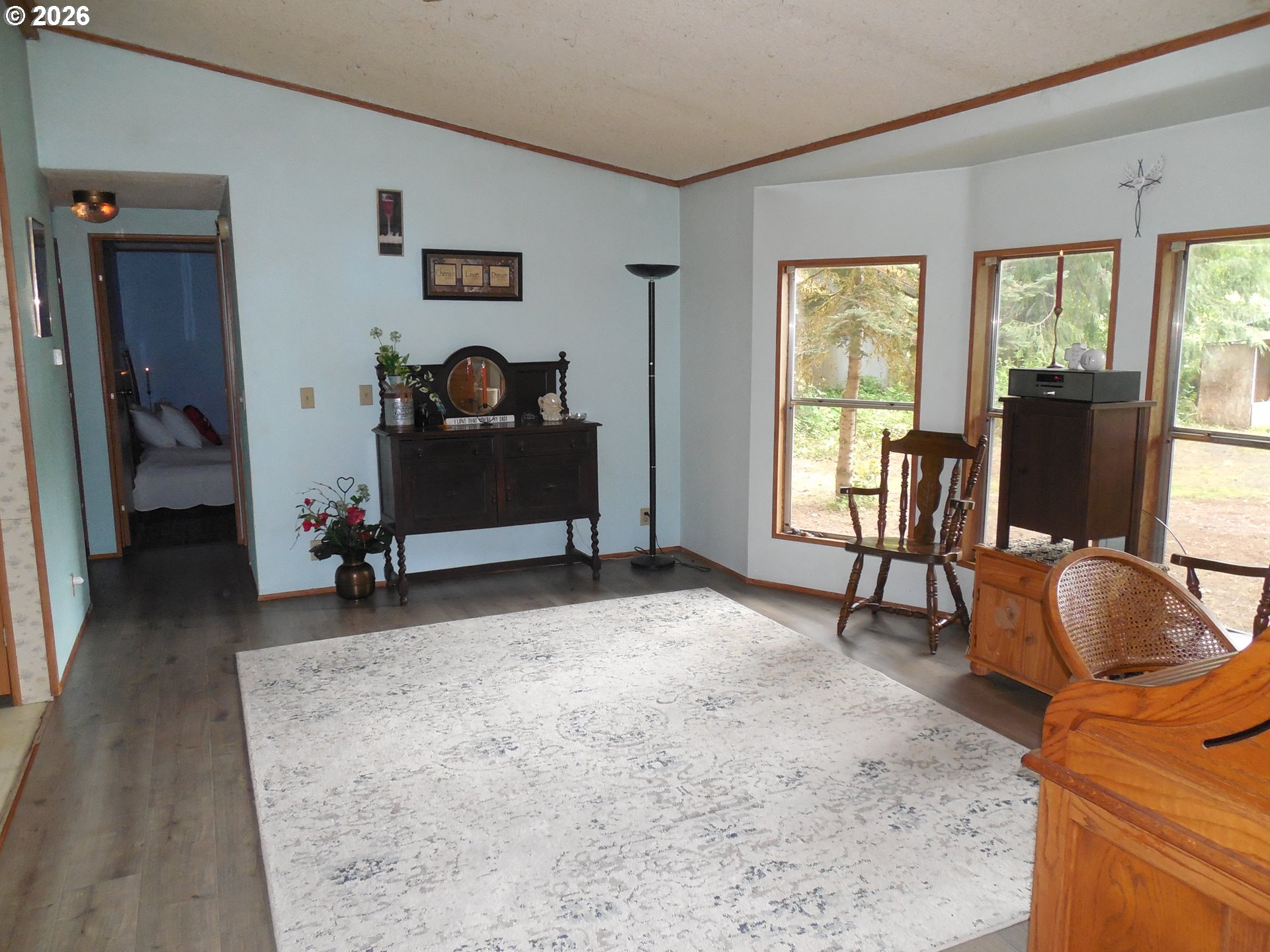 41180 Southeast Kubitz Road Sandy, OR 97055 - Photo 14 of 35 a living room with furniture and a window