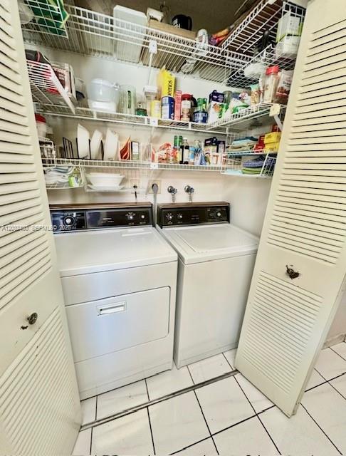 6527 West 22nd Lane Hialeah, FL 33016 - Photo 8 of 18 a utility room with dryer and washer