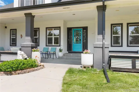 a front view of a house with porch