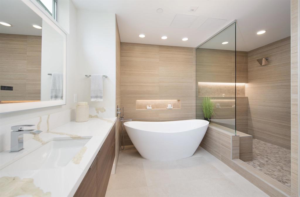 2501 State Street Carlsbad, CA 92008 - Photo 11 of 32 a bathroom with a bathtub and a sink