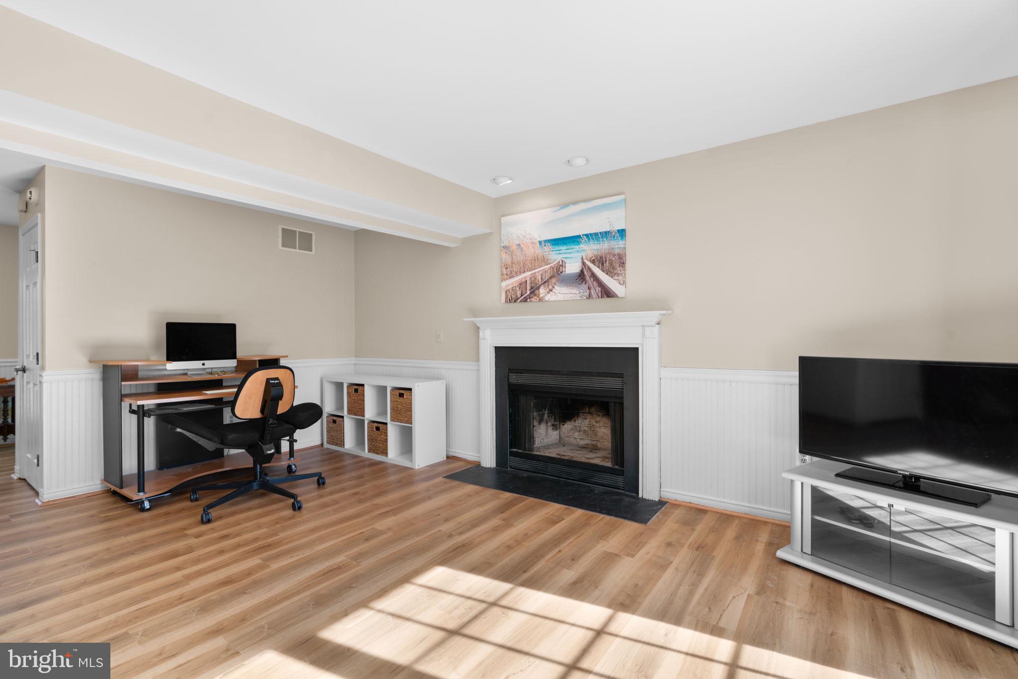 103 Idlewild Road Severna Park, MD 21146 - Photo 13 of 39 a living room with furniture and a flat screen tv