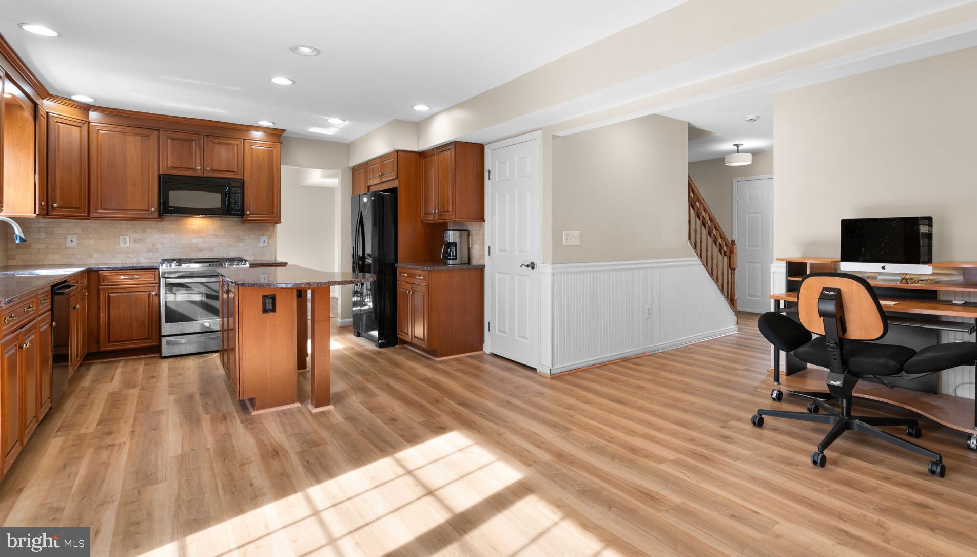 103 Idlewild Road Severna Park, MD 21146 - Photo 14 of 39 a view of kitchen with sink microwave and refrigerator