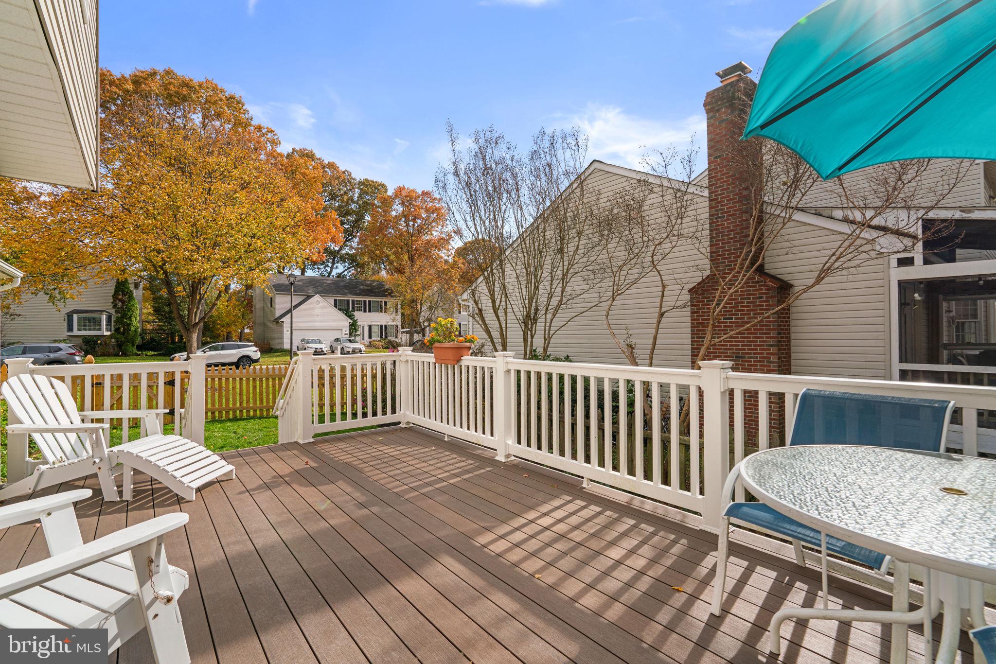 103 Idlewild Road Severna Park, MD 21146 - Photo 3 of 39 a view of a deck with two chair and table