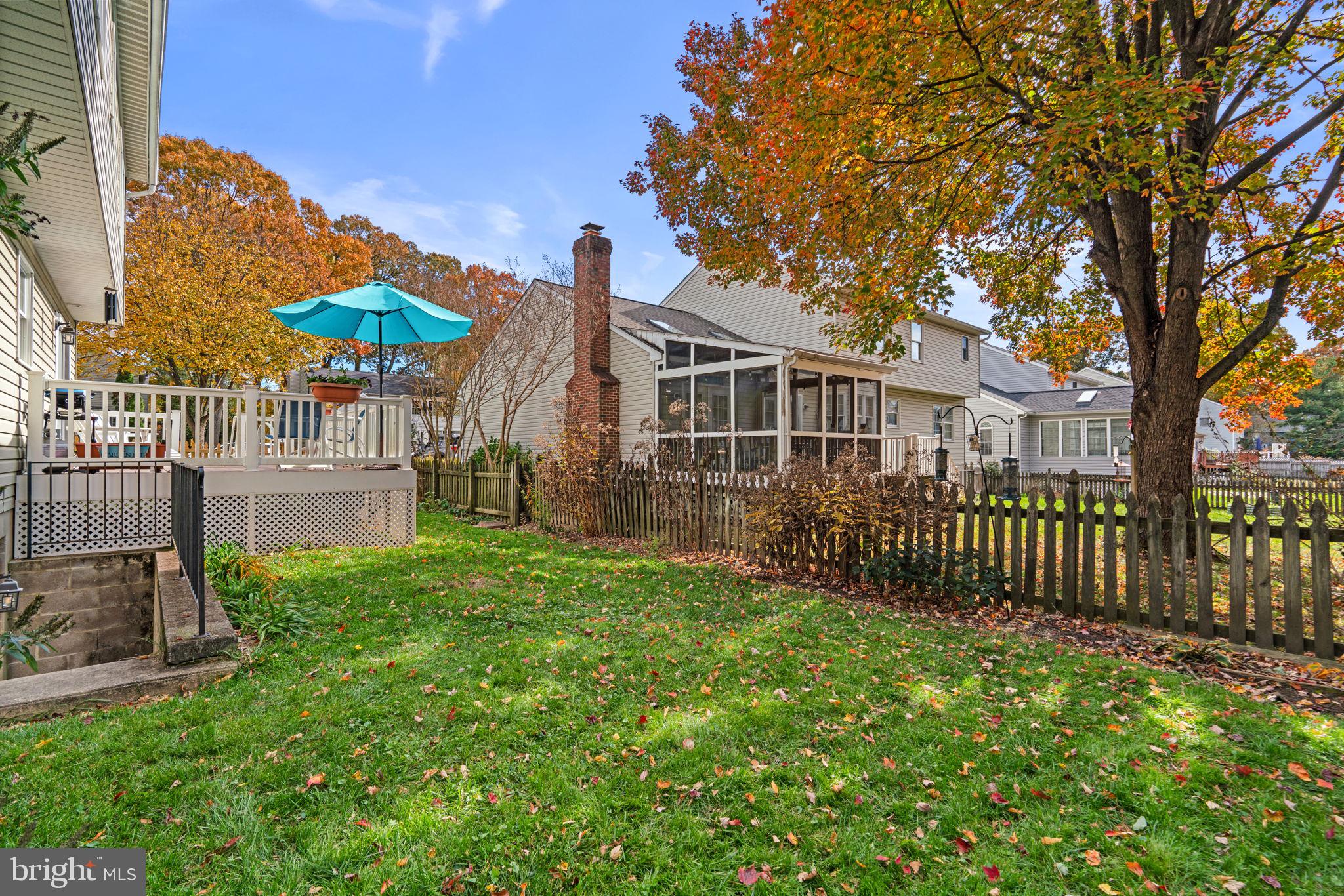 103 Idlewild Road Severna Park, MD 21146 - Photo 33 of 39 a view of a house with a yard and a garden