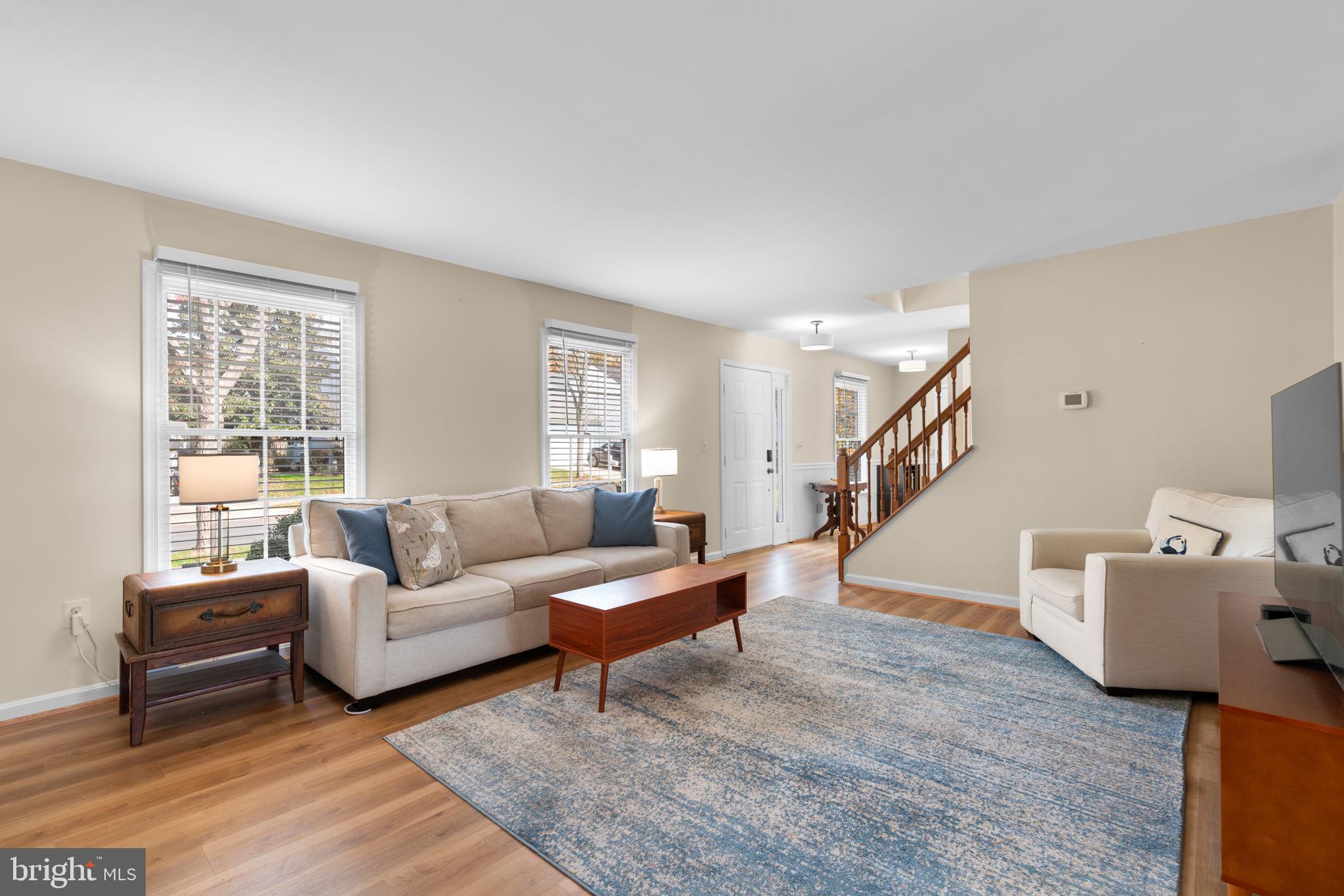 103 Idlewild Road Severna Park, MD 21146 - Photo 4 of 39 a living room with furniture and wooden floor