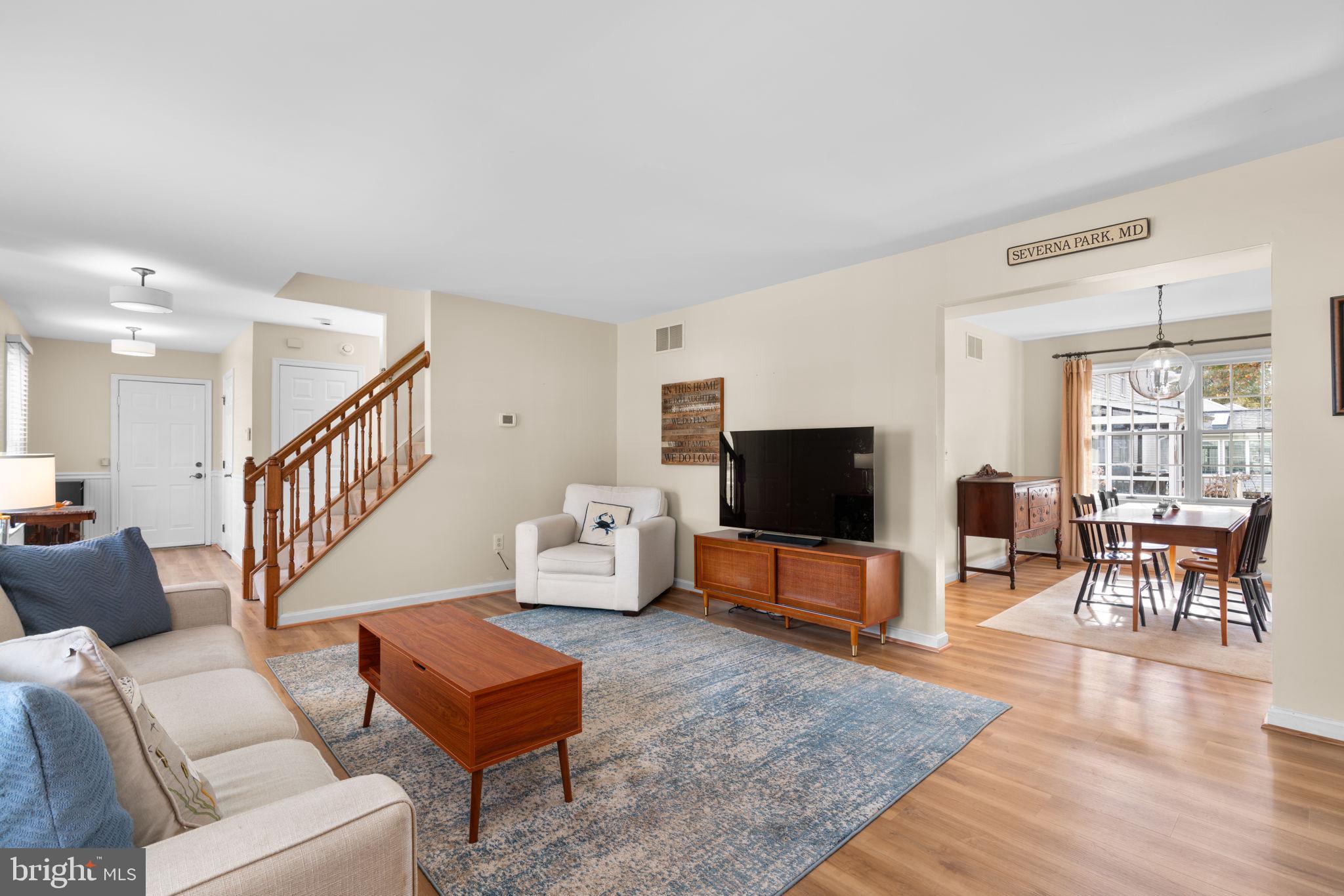 103 Idlewild Road Severna Park, MD 21146 - Photo 6 of 39 a living room with furniture and a flat screen tv