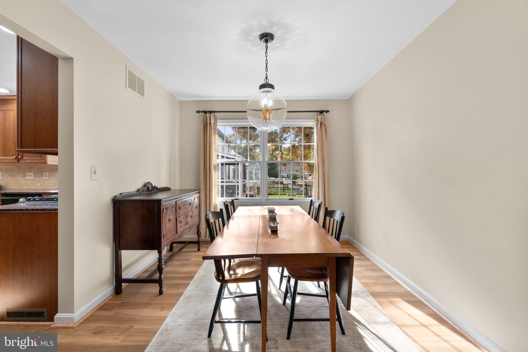 103 Idlewild Road Severna Park, MD 21146 - Photo 7 of 39 a view of a dining room with furniture window and outside view