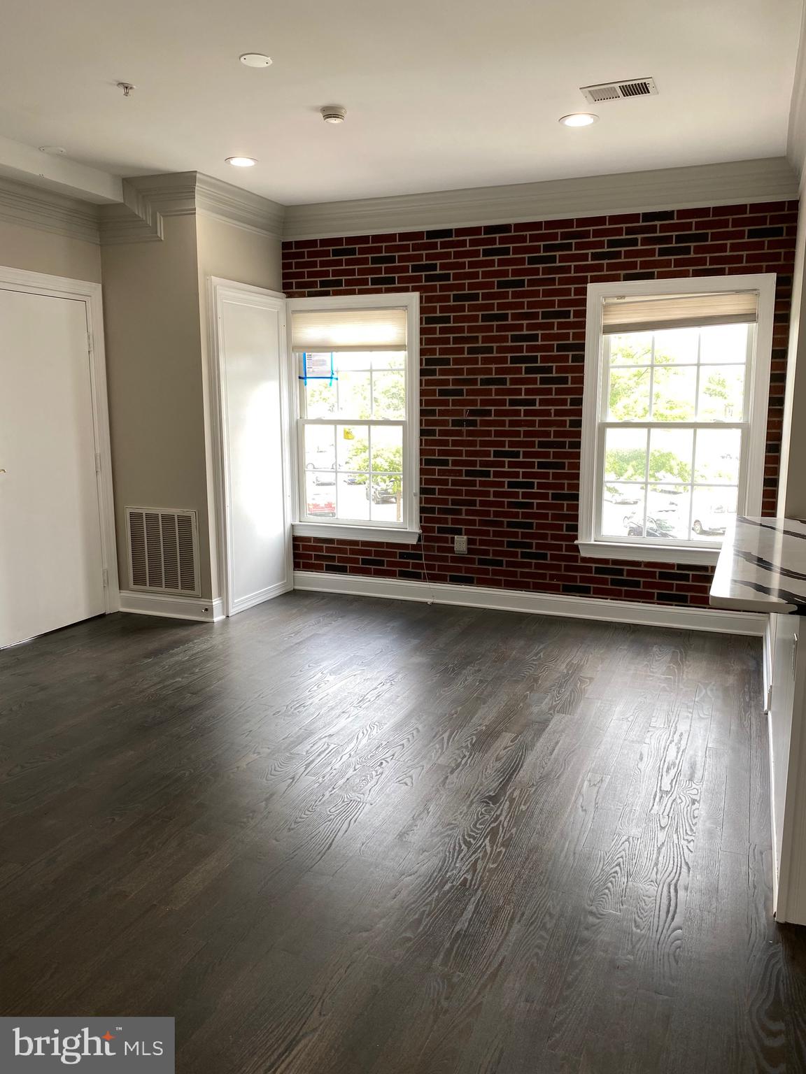352 Main Street, Unit 3 Gaithersburg, MD 20878 - Photo 13 of 17 2 windows in living room