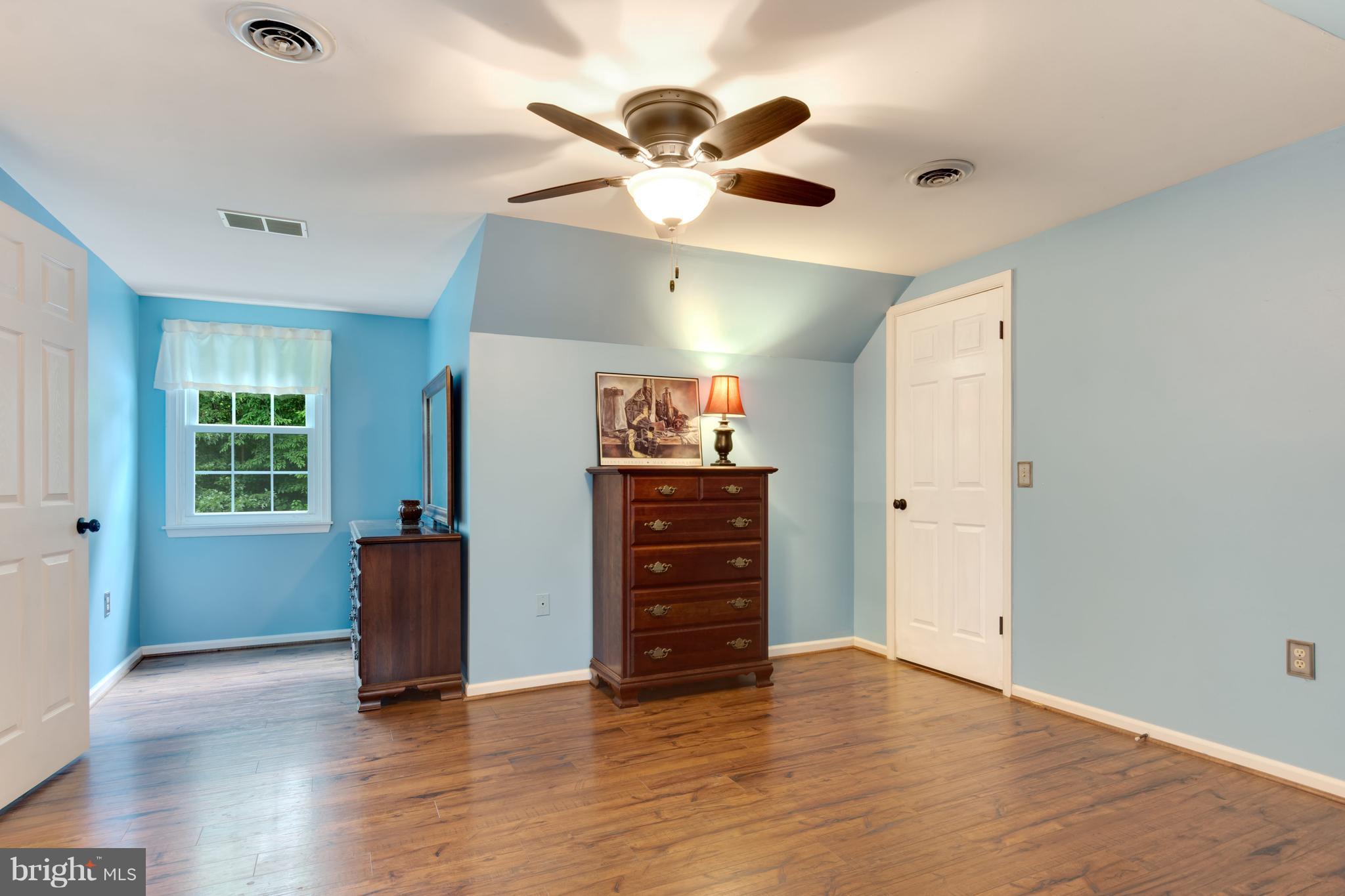 5 Reed Court Chestertown, MD 21620 - Photo 16 of 27 wooden floor in an empty room with a window