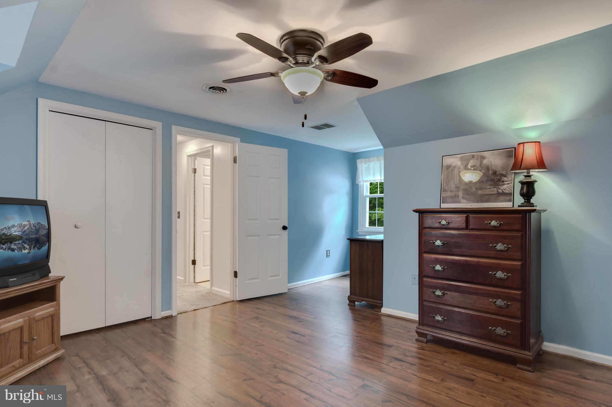 5 Reed Court Chestertown, MD 21620 - Photo 17 of 27 a view of a livingroom with a furniture wooden floor and a ceiling fan
