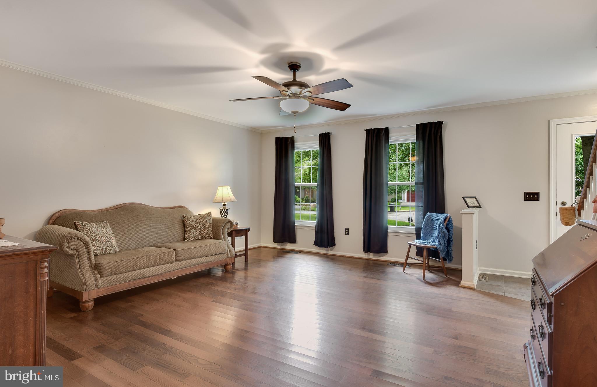 5 Reed Court Chestertown, MD 21620 - Photo 5 of 27 a living room with furniture and a chandelier