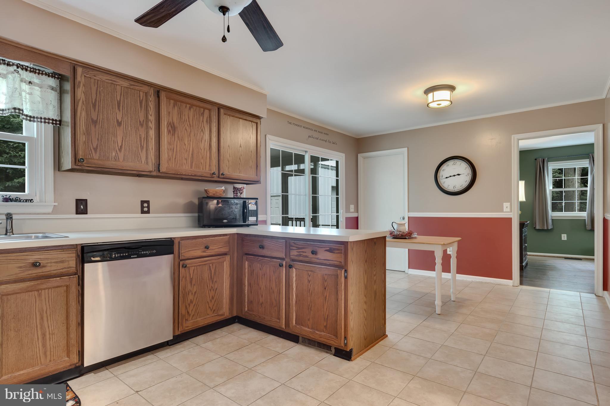 5 Reed Court Chestertown, MD 21620 - Photo 8 of 27 a kitchen with cabinets and chairs
