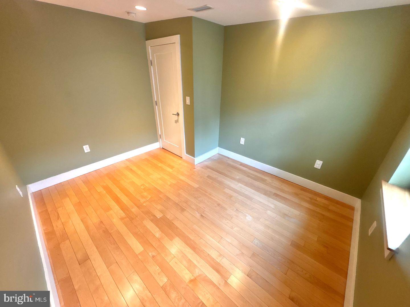 533 Manton Street Philadelphia, PA 19147 - Photo 11 of 22 a view of an empty room with wooden floor