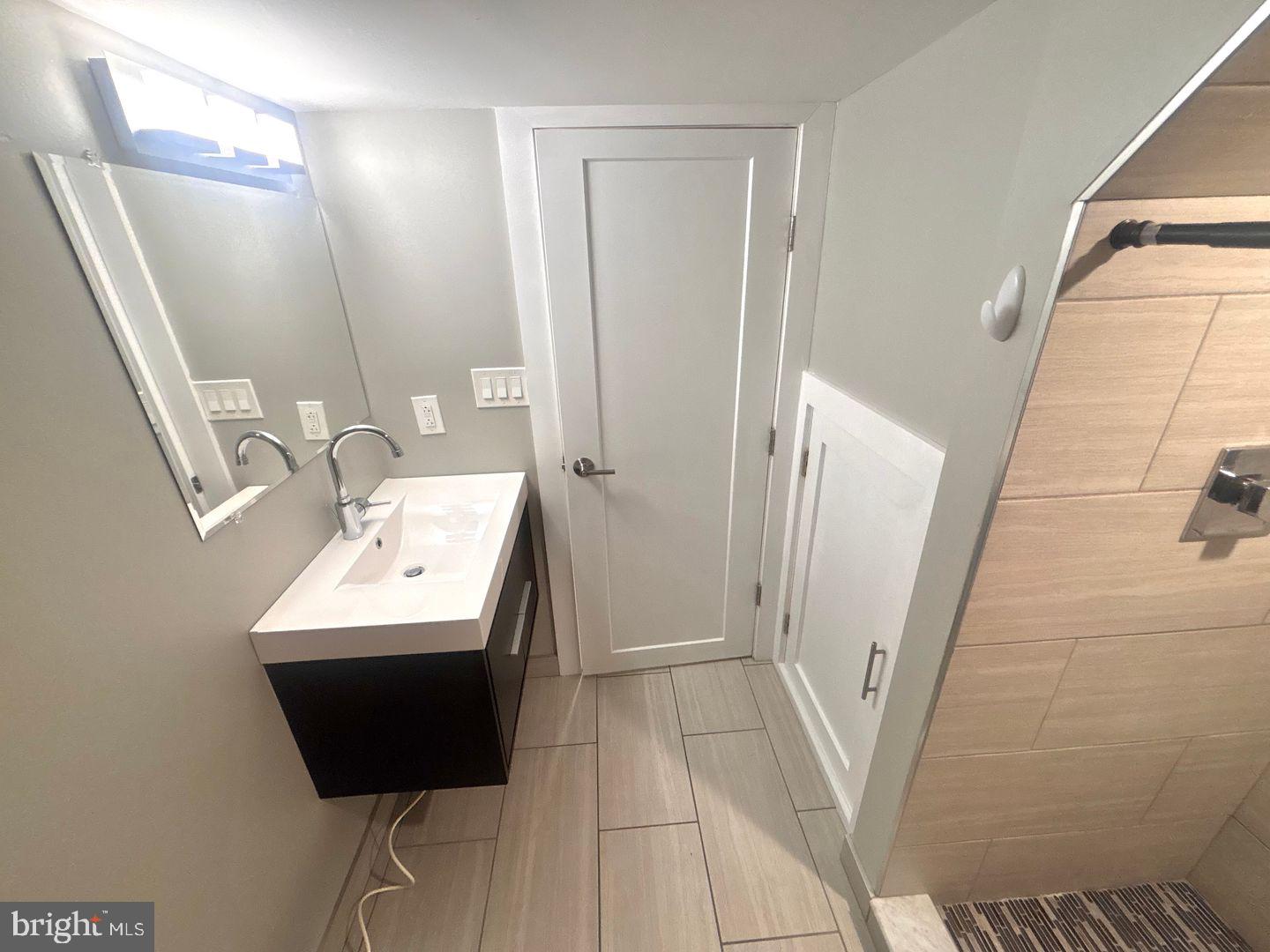 533 Manton Street Philadelphia, PA 19147 - Photo 21 of 22 a bathroom with a sink toilet and shower