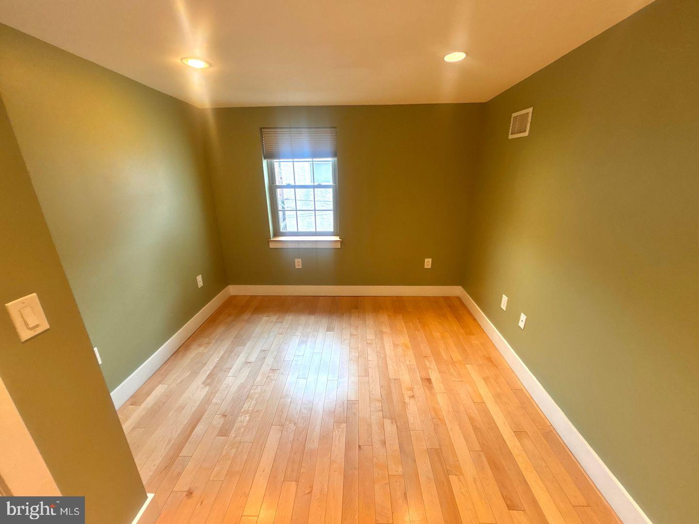 533 Manton Street Philadelphia, PA 19147 - Photo 9 of 22 a view of empty room with wooden floor and fan