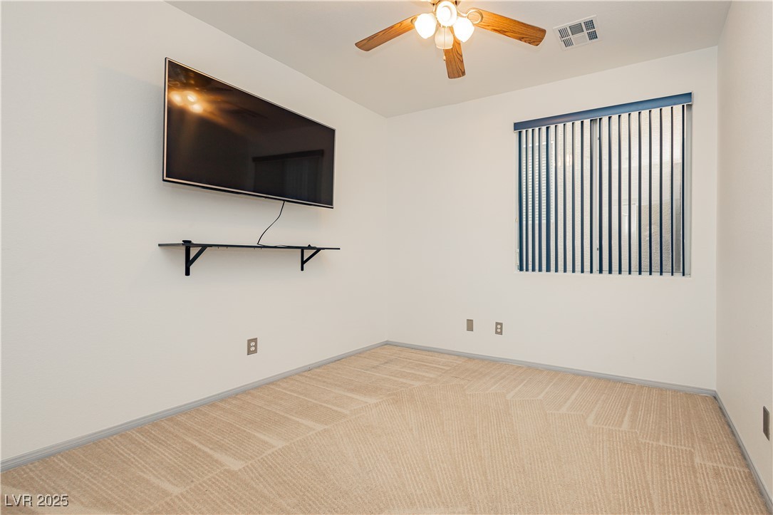 97 Parker Ranch Drive Henderson, NV 89012 - Photo 15 of 51 Downstairs Bedroom with TV