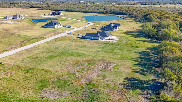 a view of swimming pool with an outdoor seating