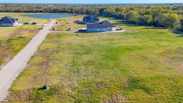 a view of a swimming pool and an outdoor space