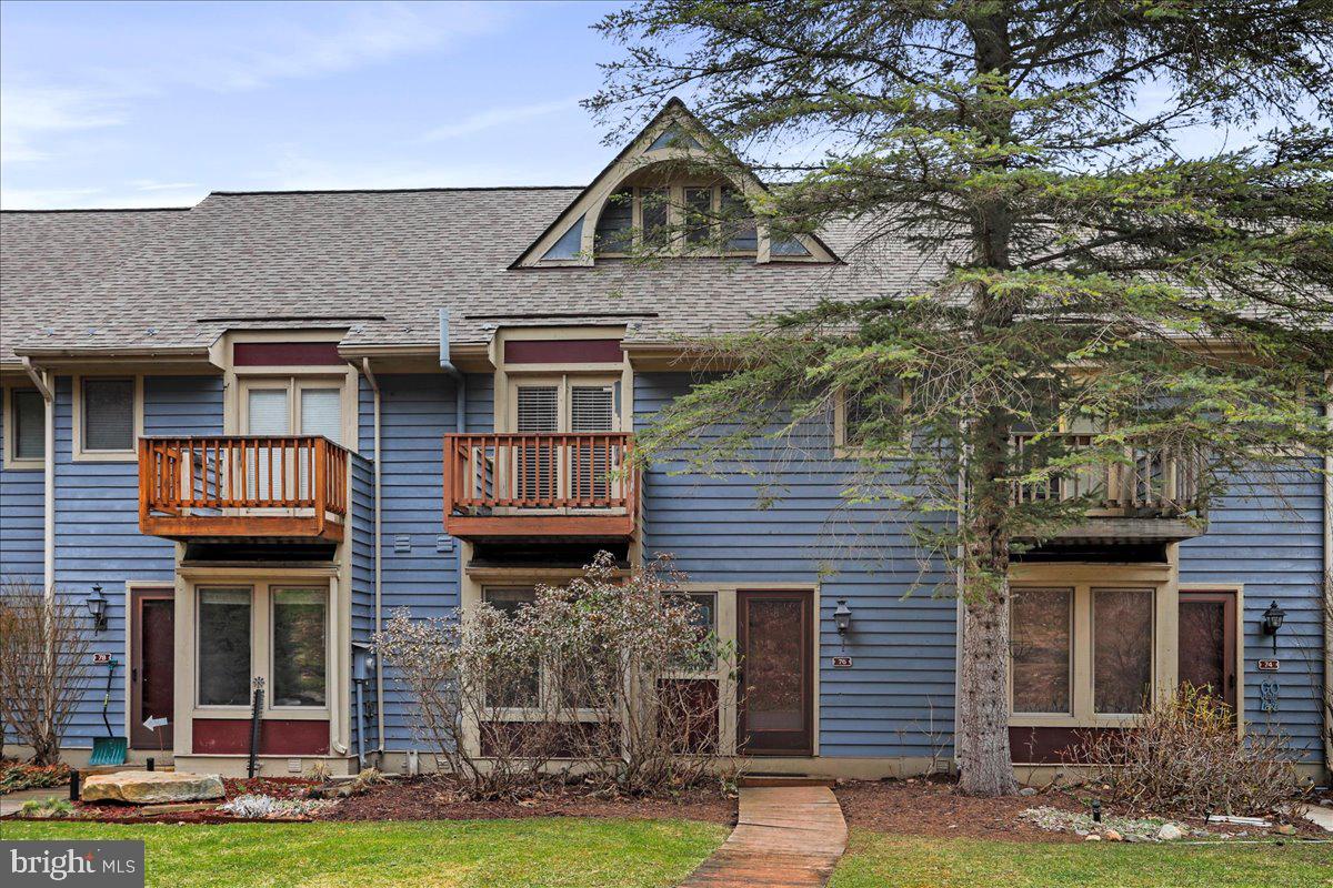 76 Bright Passage McHenry, MD 21541 - Photo 1 of 63 a front view of a house with garden