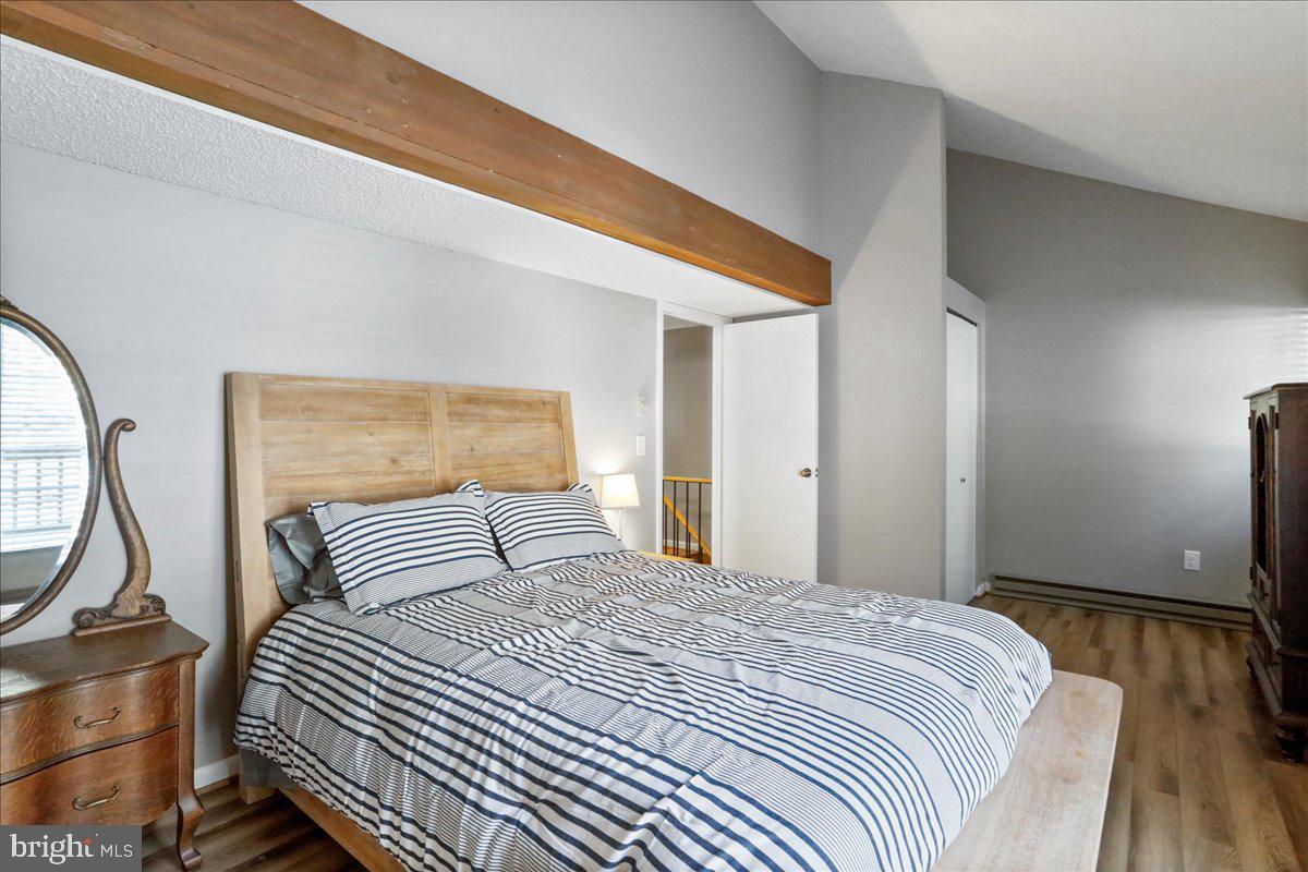 76 Bright Passage McHenry, MD 21541 - Photo 21 of 63 a bedroom with a bed and a painting on the wall