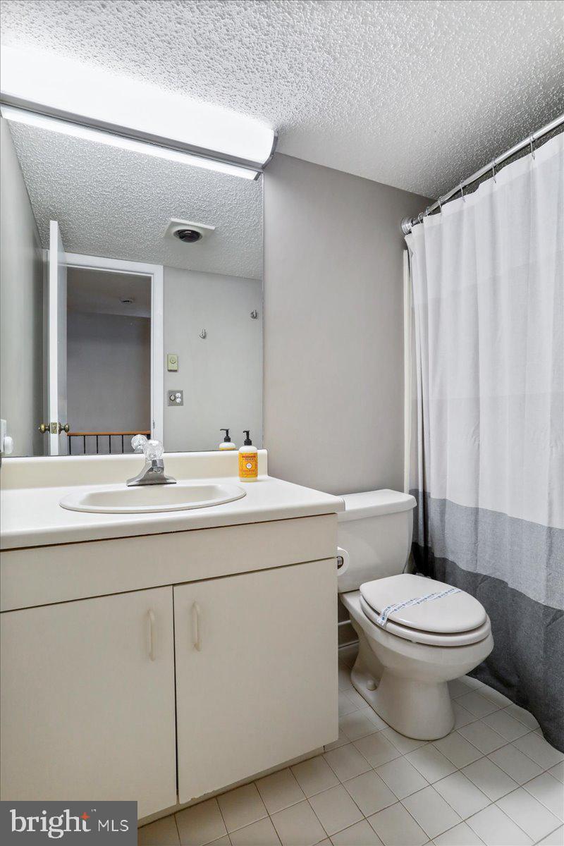 76 Bright Passage McHenry, MD 21541 - Photo 23 of 63 a bathroom with a toilet sink and mirror