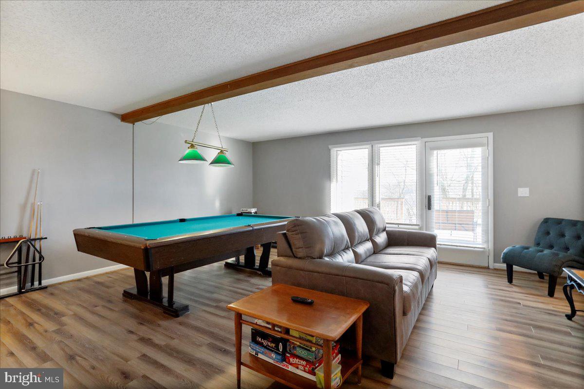 76 Bright Passage McHenry, MD 21541 - Photo 28 of 63 a living room with furniture and a wooden floor