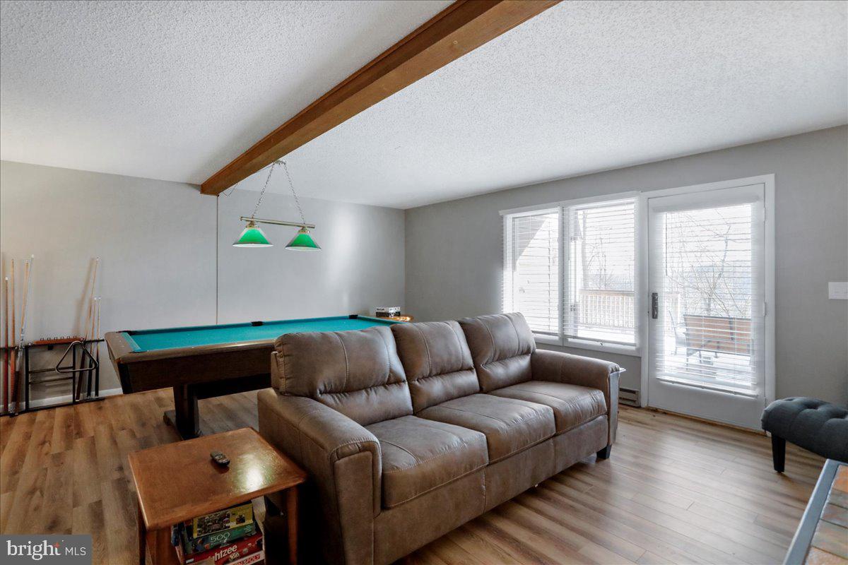 76 Bright Passage McHenry, MD 21541 - Photo 31 of 63 a living room with furniture and a window