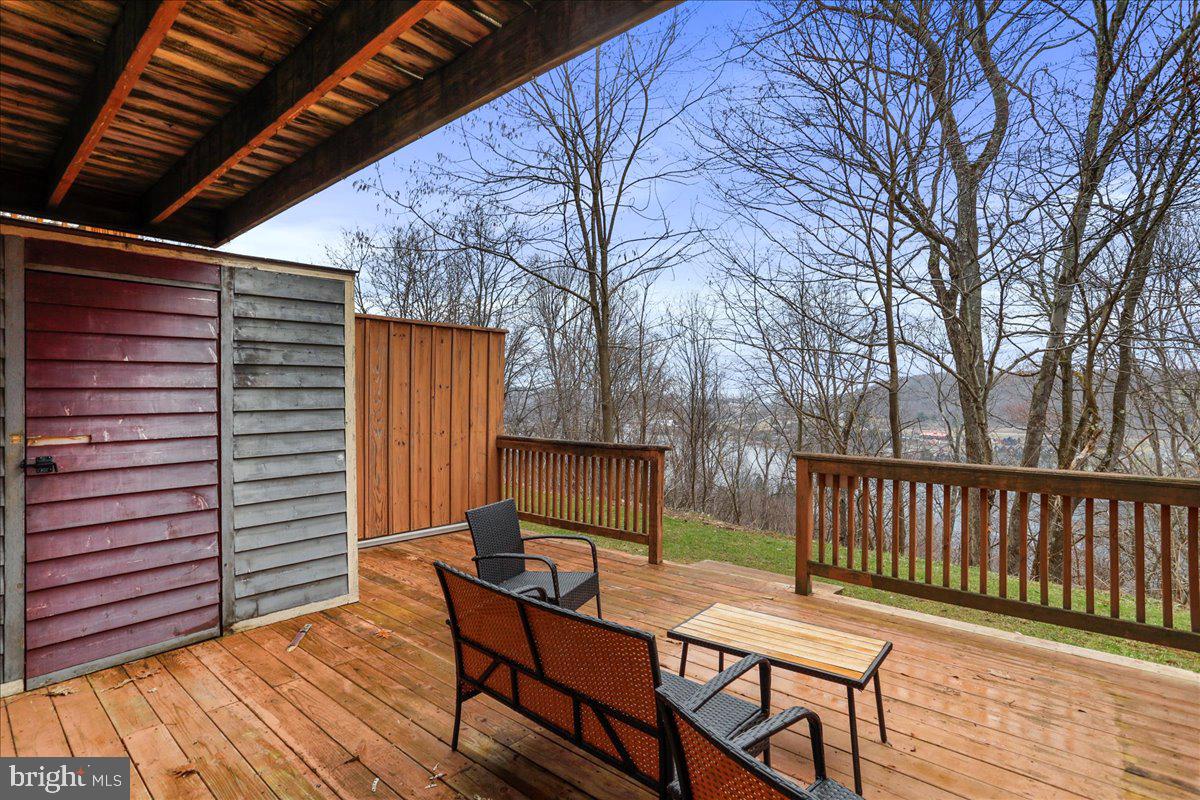 76 Bright Passage McHenry, MD 21541 - Photo 34 of 63 a view of a deck with furniture and wooden floor
