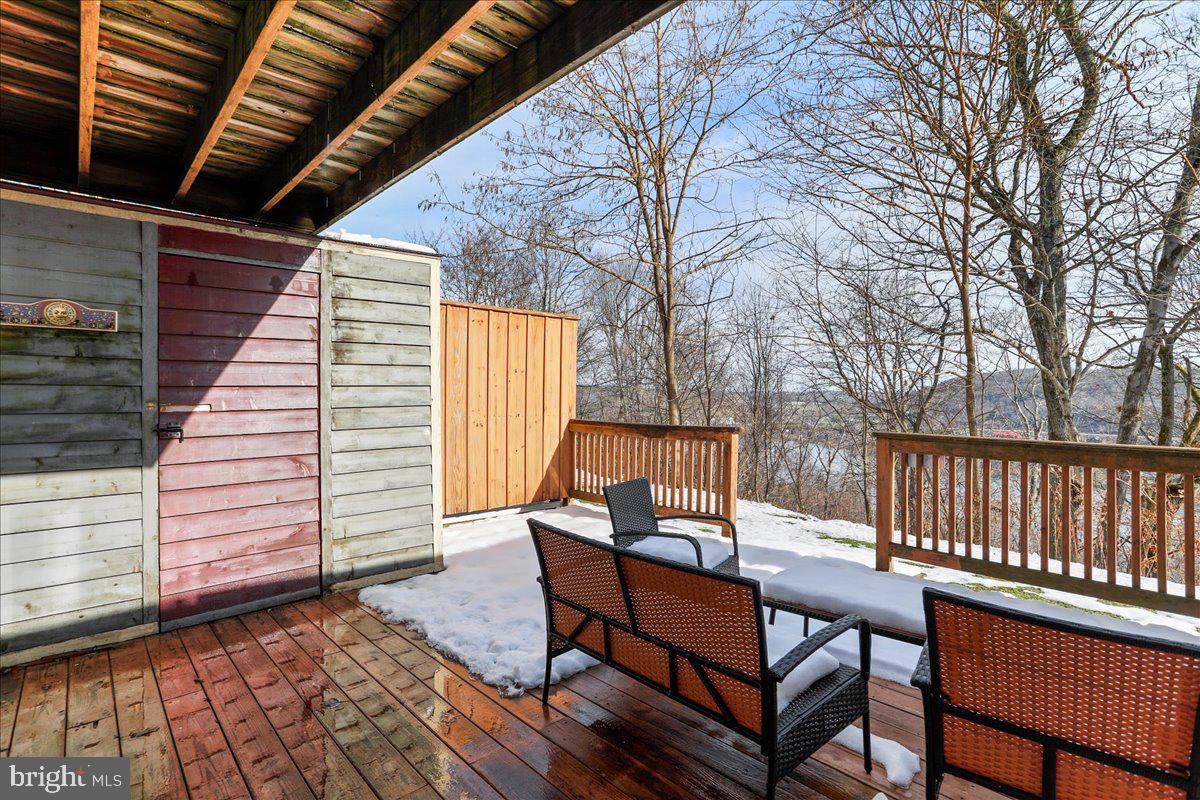 76 Bright Passage McHenry, MD 21541 - Photo 40 of 63 a view of a wooden deck with furniture