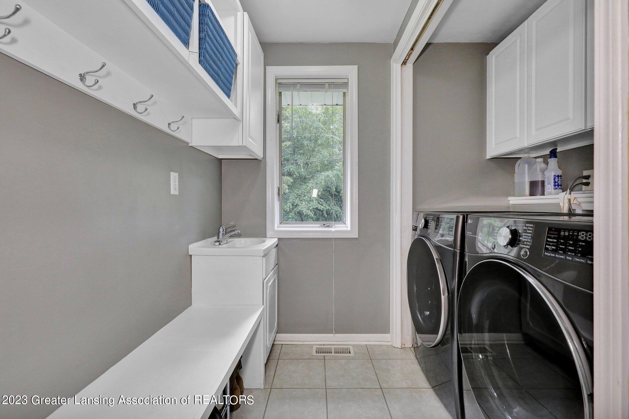 12591 Airport Road Dewitt, MI 48820 - Photo 16 of 46 First Floor Laundry