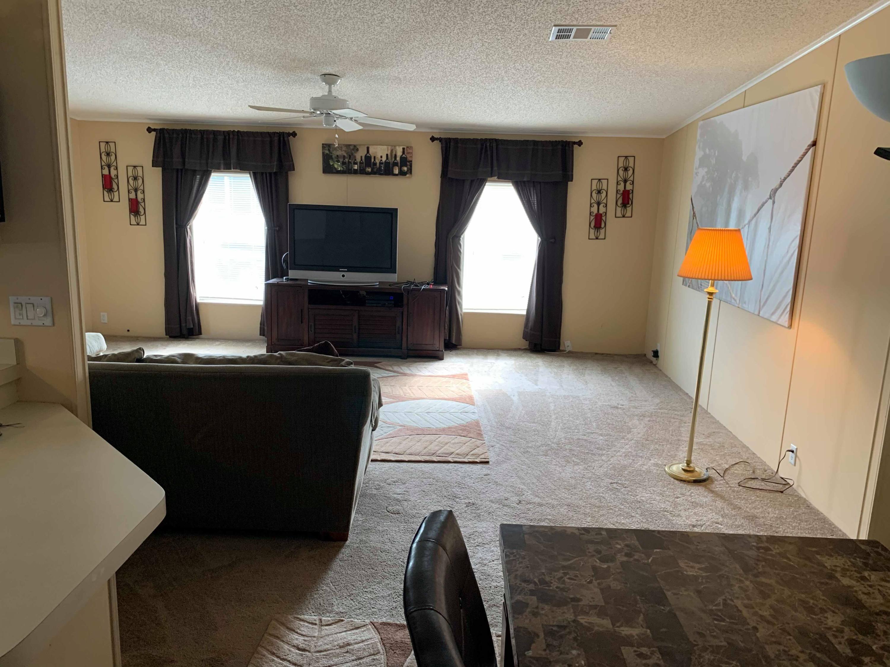 1531 Southwest 65th Avenue Boca Raton, FL 33428 - Photo 9 of 25 a view of living room with furniture and a fireplace