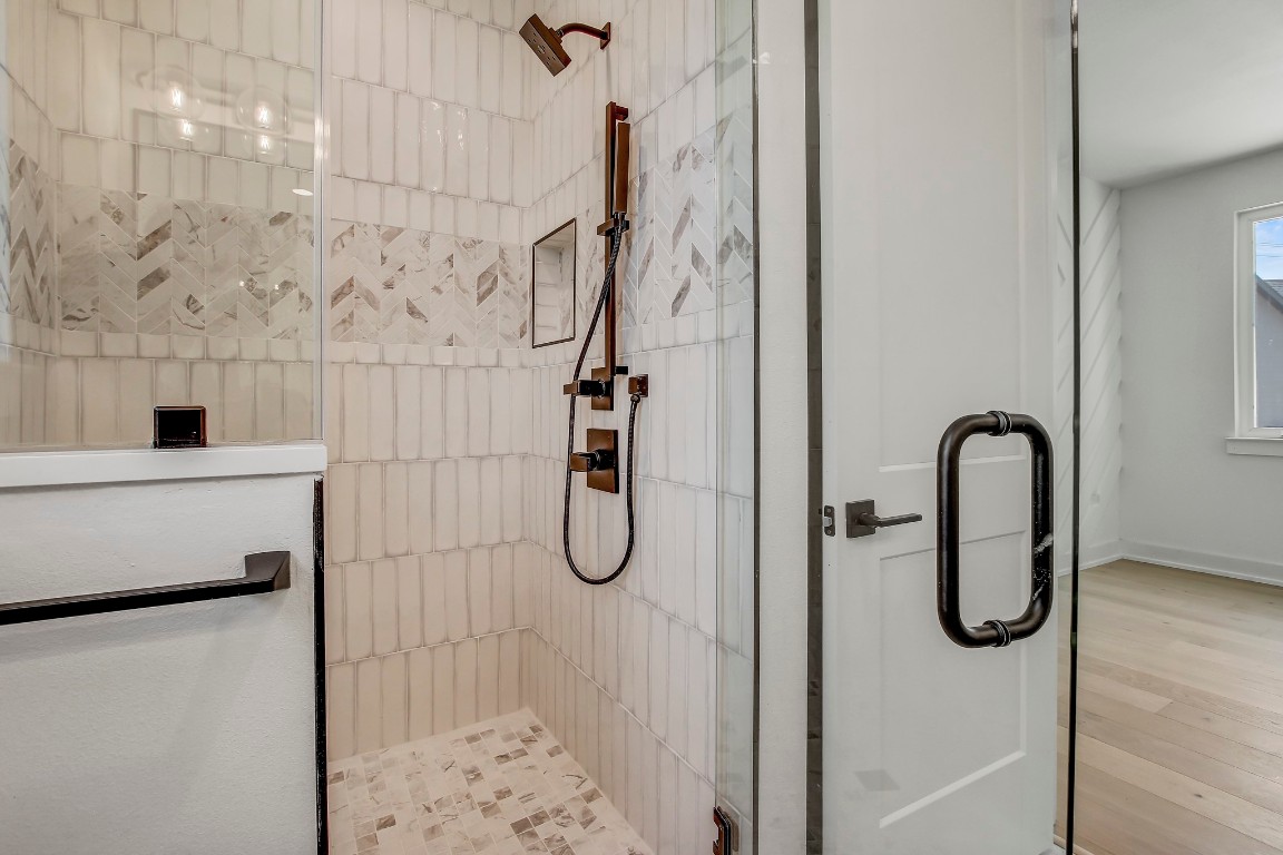 4127 East 12th Street, Unit 3 Austin, TX 78721 - Photo 18 of 29 a bathroom with a shower