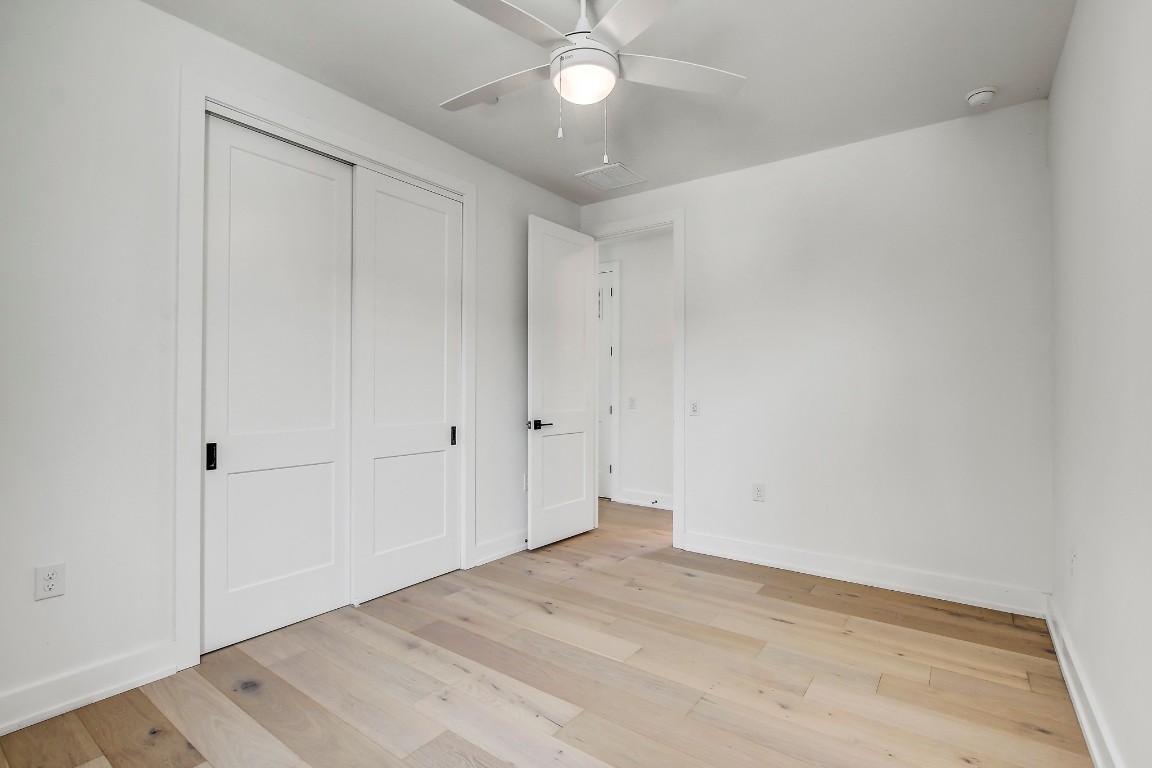 4127 East 12th Street, Unit 3 Austin, TX 78721 - Photo 21 of 29 wooden floor in an empty room