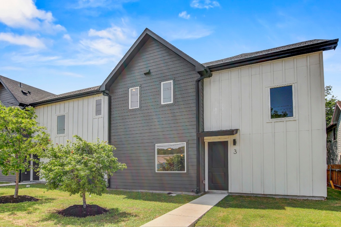 4127 East 12th Street, Unit 3 Austin, TX 78721 - Photo 27 of 29 a house with swimming pool in front of it