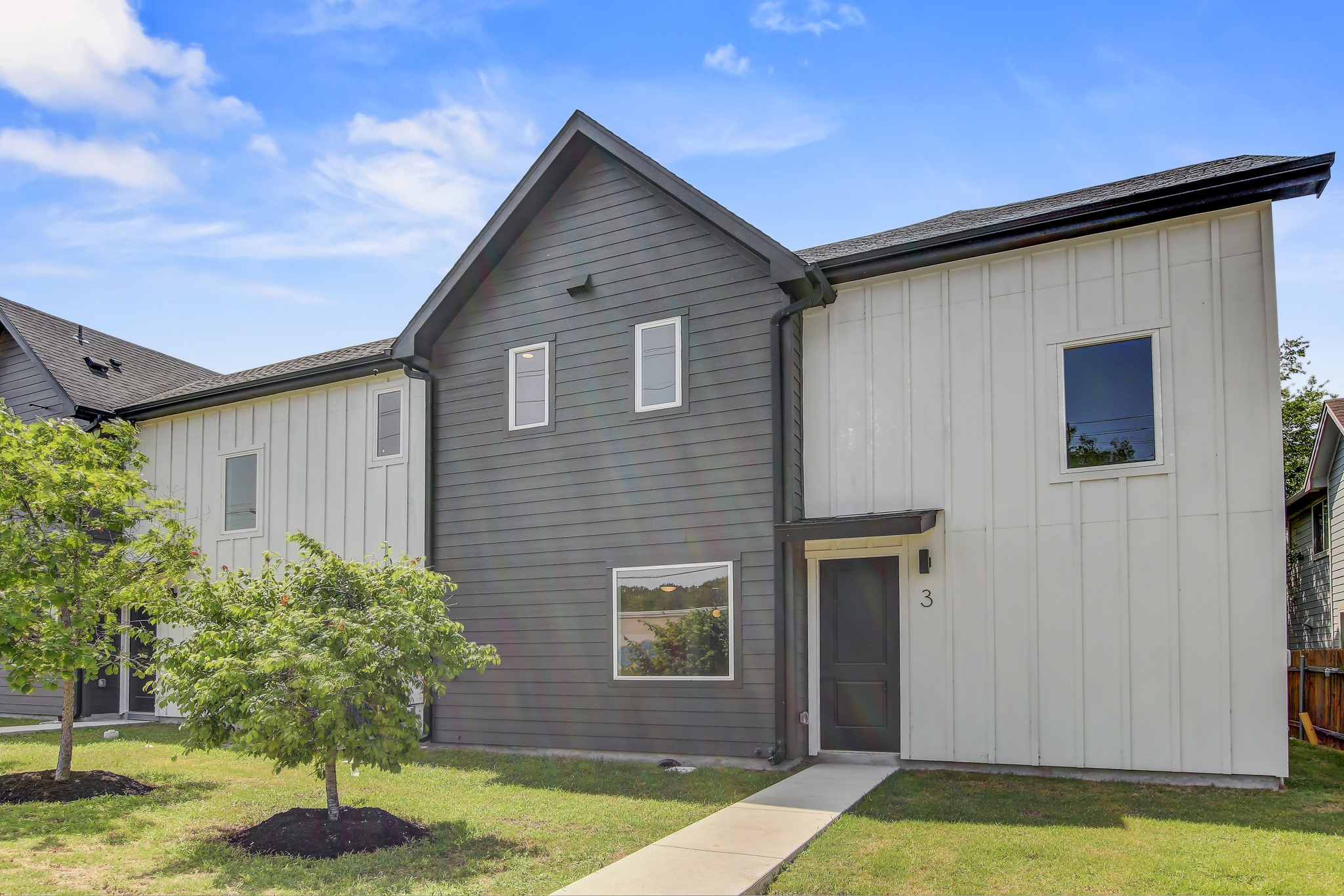 4127 East 12th Street, Unit 3 Austin, TX 78721 - Photo 27 of 29 a house with swimming pool in front of it
