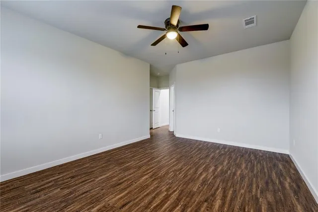 a kitchen with stainless steel appliances granite countertop a refrigerator stove and sink