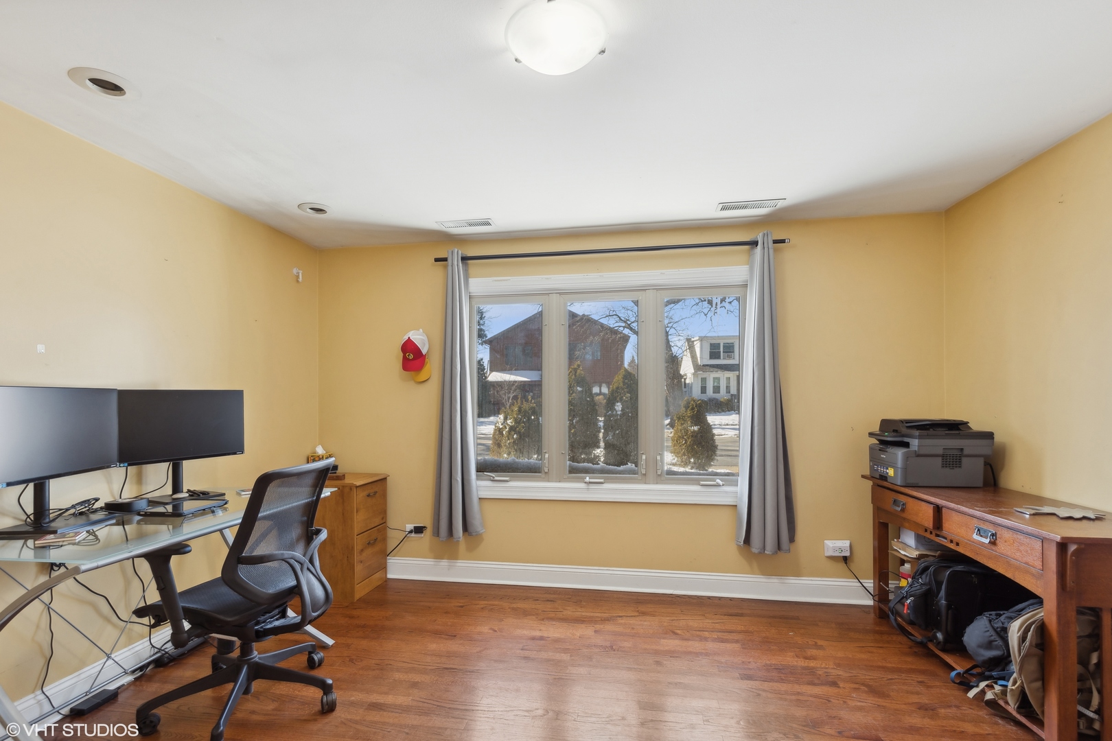 1115 Potter Road Park Ridge, IL 60068 - Photo 11 of 24 a view of a workspace with furniture and a window