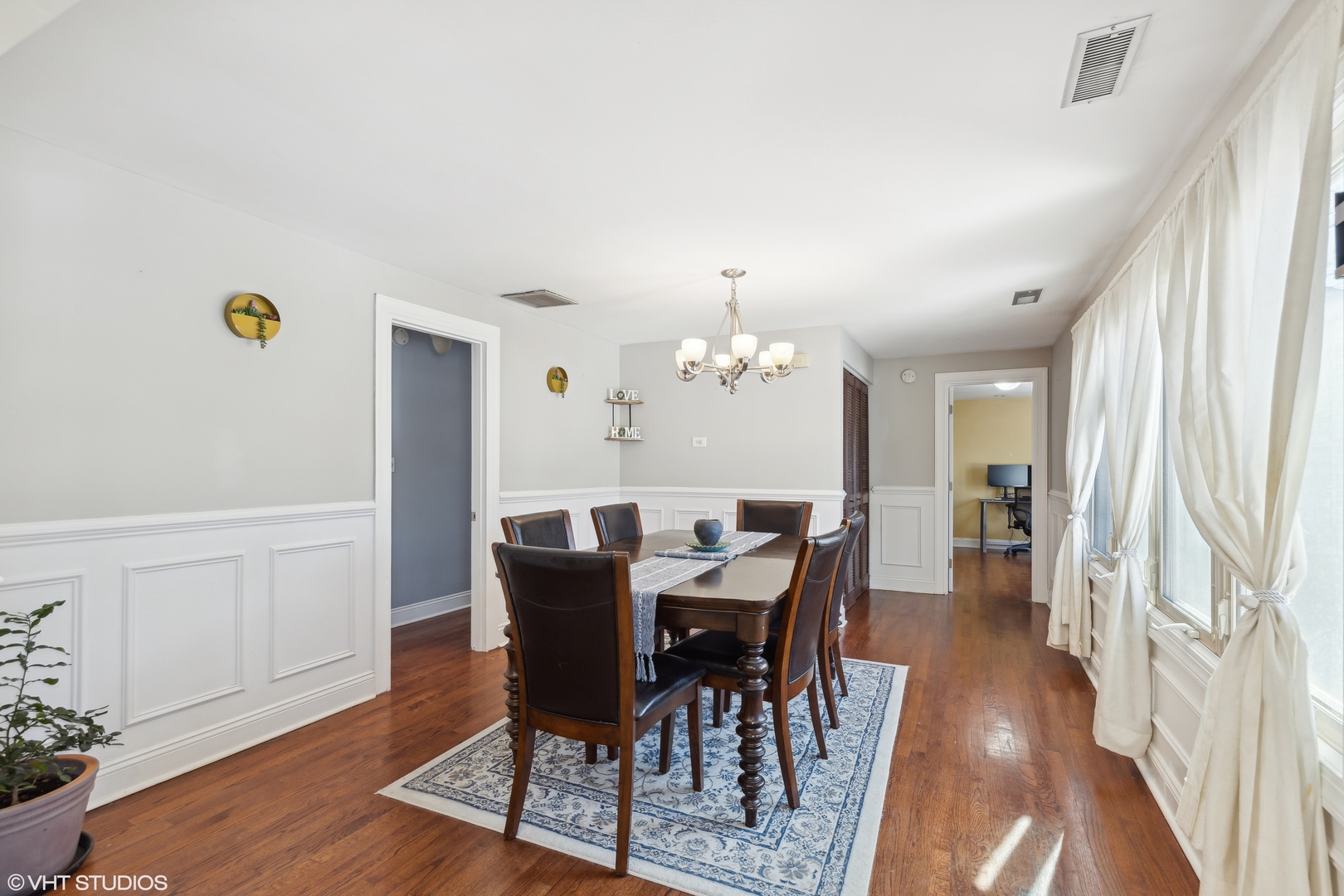 1115 Potter Road Park Ridge, IL 60068 - Photo 10 of 24 a view of a dining room with furniture and wooden floor